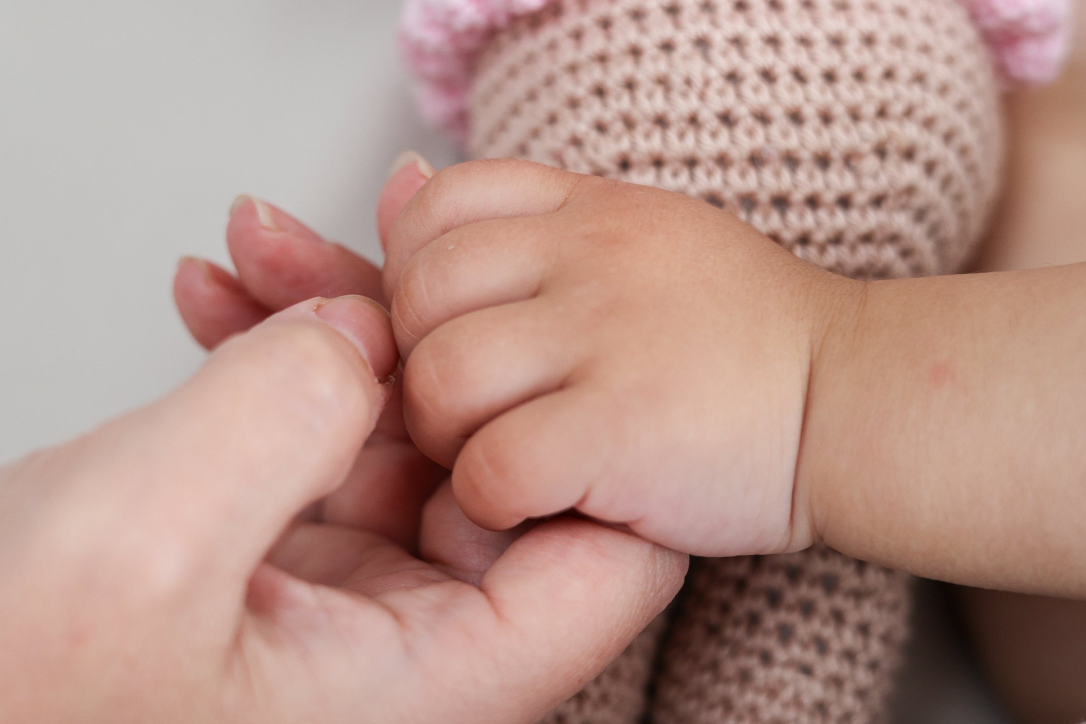 Mother and Daughter Holding Hands